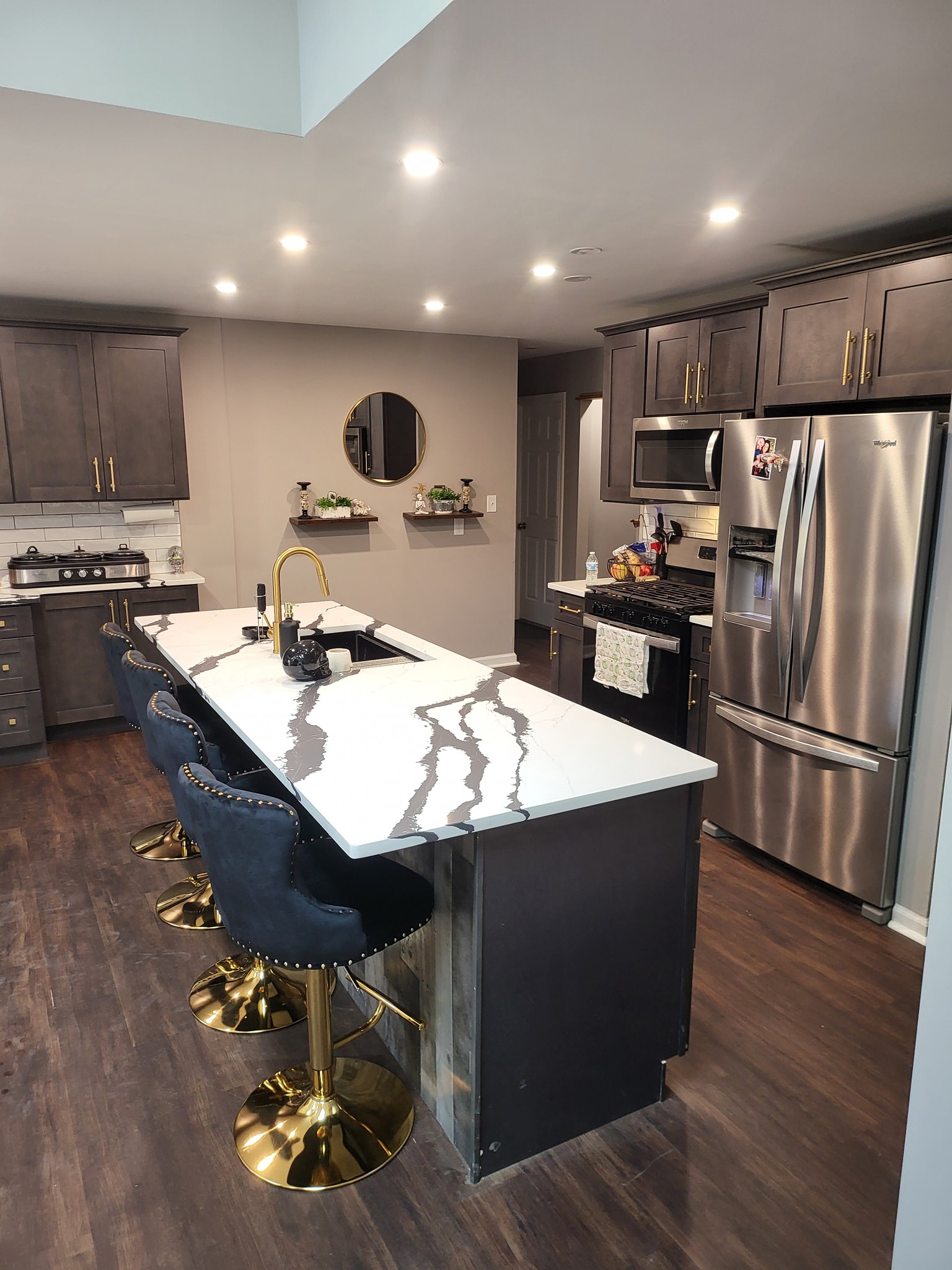 Modern kitchen renovation showcasing new cabinets and countertops