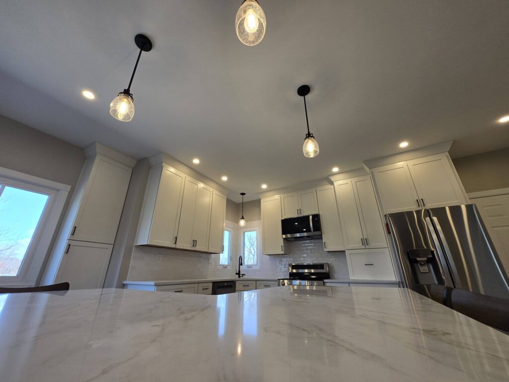 Statement pendant lighting over the kitchen island - LR Contracting, Honey Brook PA