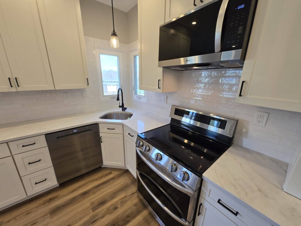 Detail of stove and dishwasher in remodeled kitchen - LR Contracting, Honey Brook PA