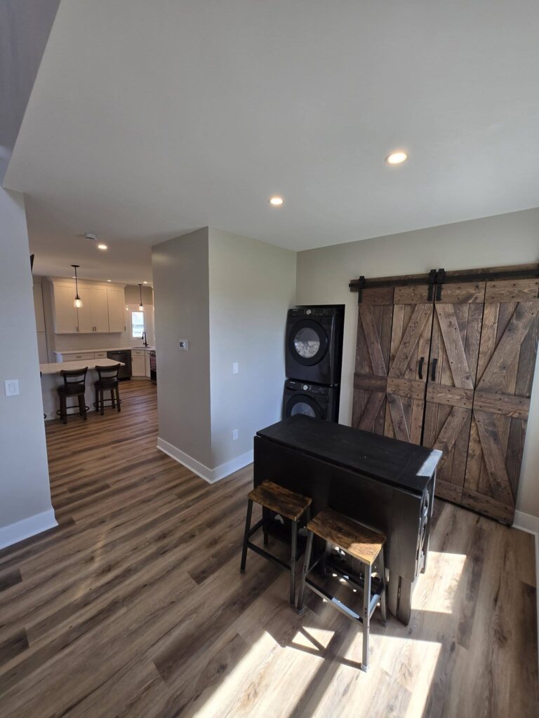Laundry room with sliding barn doors - LR Contracting, Honey Brook PA