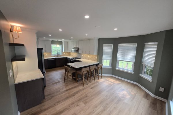 Kitchen and dining area with two-tone cabinetry - LR Contracting, Sadsburyville PA