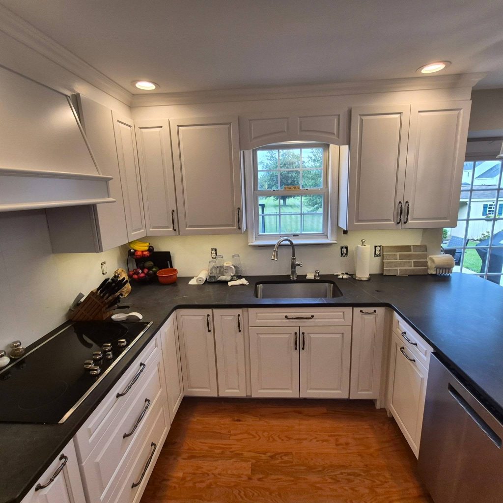 U-shaped kitchen with white cabinets and slate-look countertops - LR Contracting, Limerick PA