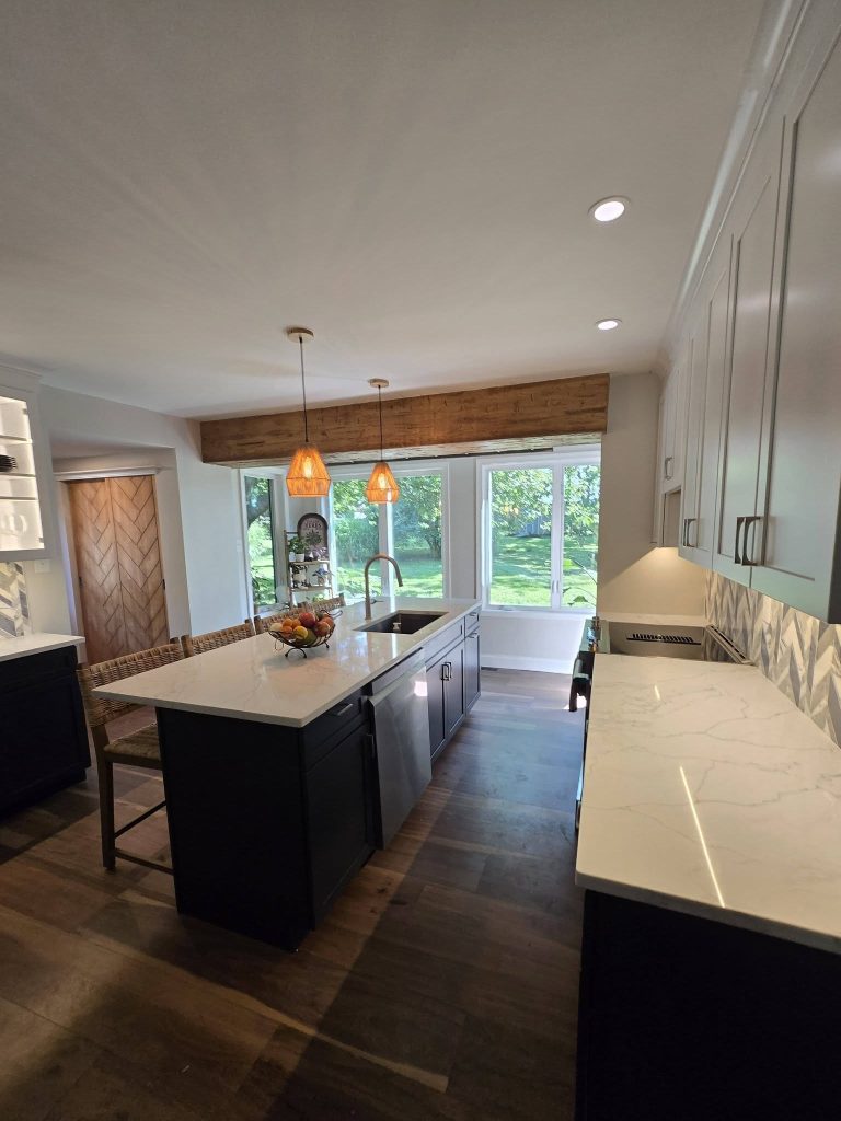 Open kitchen with navy island and quartz countertops - LR Contracting, Downingtown PA