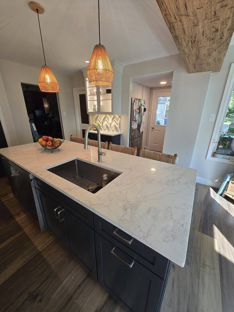 Quartz island with undermount sink and wicker pendants - LR Contracting, Downingtown PA