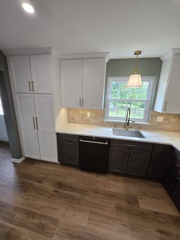 Sink wall with white pantry cabinets and stone backsplash - LR Contracting, Sadsburyville PA