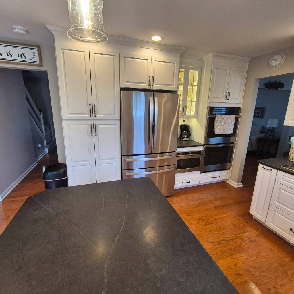 Peninsula countertop with refrigerator and ovens behind - LR Contracting, Limerick PA