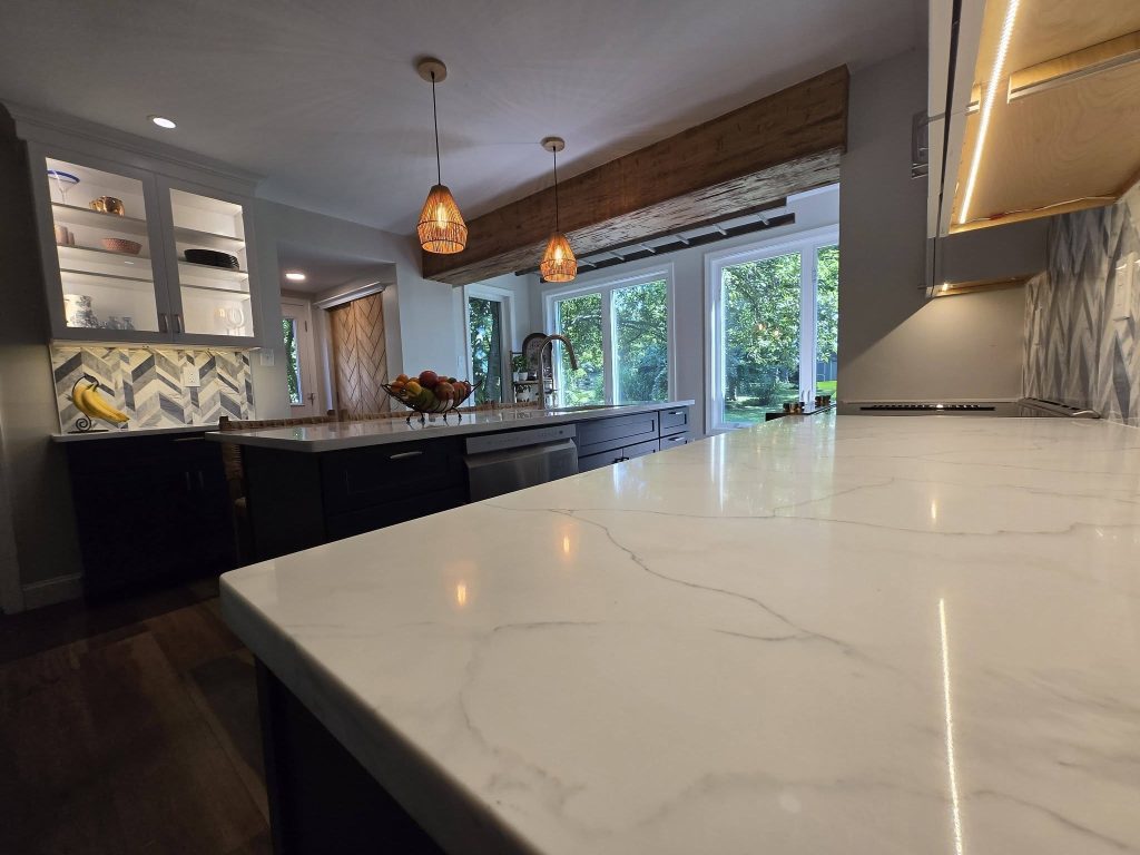 Quartz countertop and glass-front cabinets with LED lighting - LR Contracting, Downingtown PA