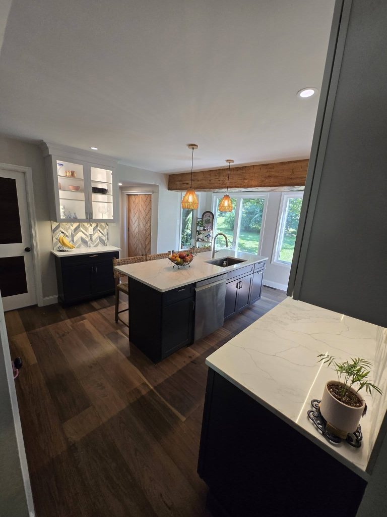 Kitchen view toward the windows and glass-front cabinets - LR Contracting, Downingtown PA